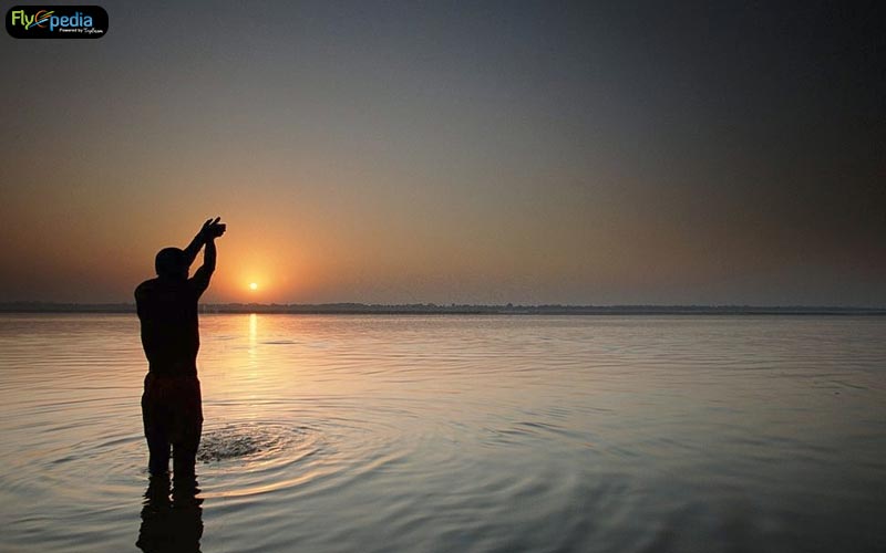Dip into the holy water of the Ganges