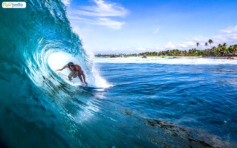 Surfing in Kovalam